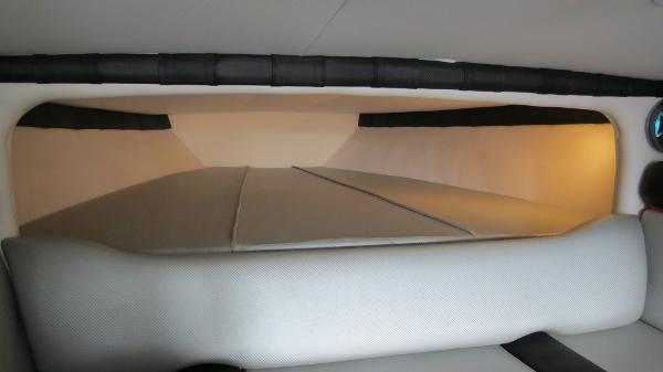 Slide: The Image of Interior cabin of a 2006 Donzi 43 ZR powerboat with cushioned seating. - 33
