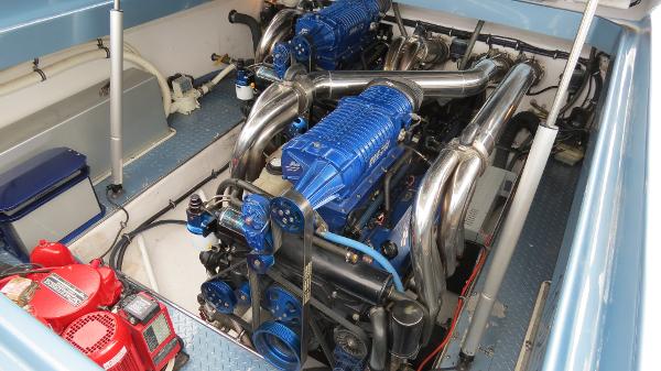 Slide: The Image of Engine compartment of a 2006 Donzi 43 ZR with twin blue supercharged engines. - 38