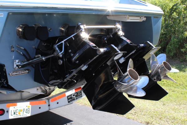 Slide: The Image of 2006 Donzi 43 ZR boat stern with dual propellers and outdrives. - 8