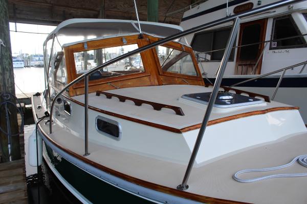 Slide: The Image of 1989 Dyer Downeast boat docked in a marina. - 3