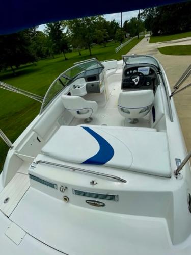 Slide: The Image of 2004 Ebbtide Campione 210 boat interior with seating and dashboard. - 3