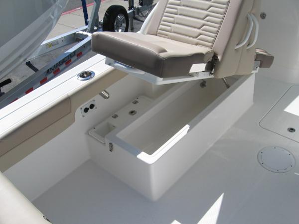 Slide: The Image of 2024 Edgewater 245CX boat seat with storage compartment. - 4