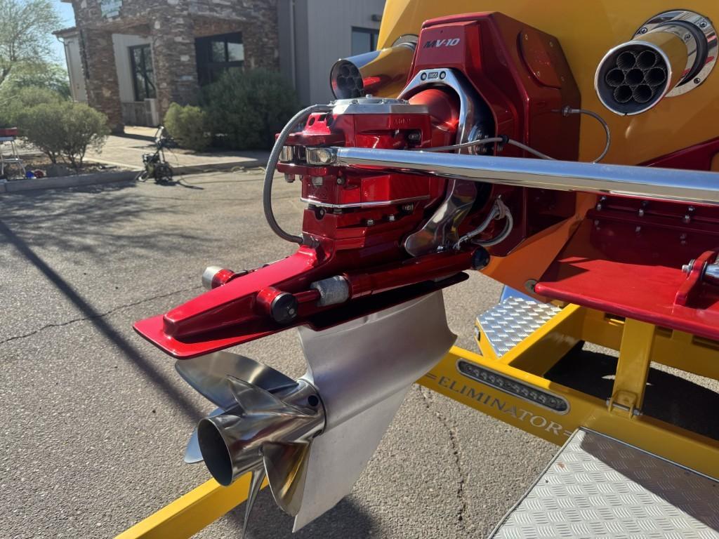 Slide: The Image of Close-up of a 2006 Eliminator 33 Daytona boat engine and propeller, showcasing sleek design. - 29