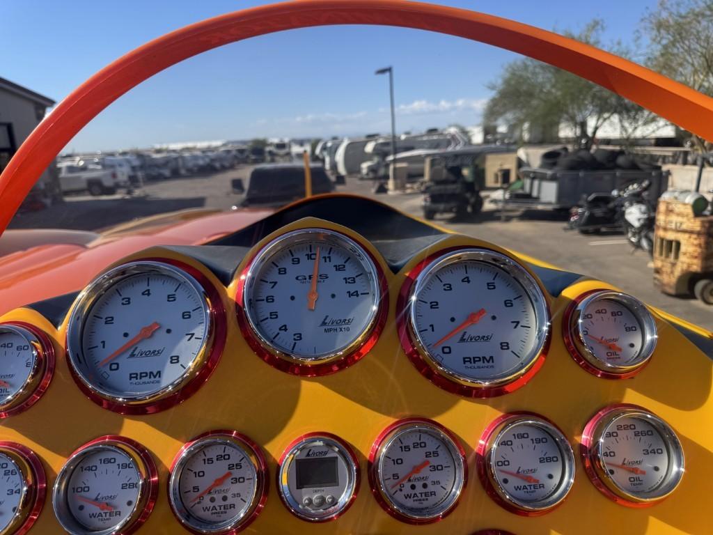 Slide: The Image of Dashboard of a 2006 Eliminator 33 Daytona boat with Livorsi gauges. - 34