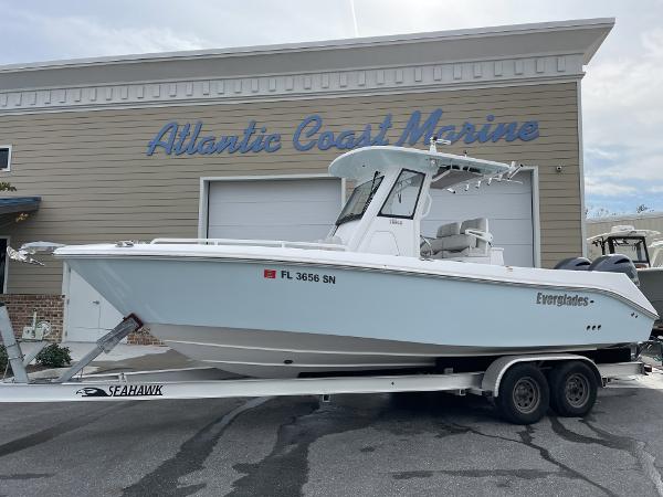 Slide: The Image of 2020 Everglades 255 CC boat on trailer at Atlantic Coast Marine. - 0