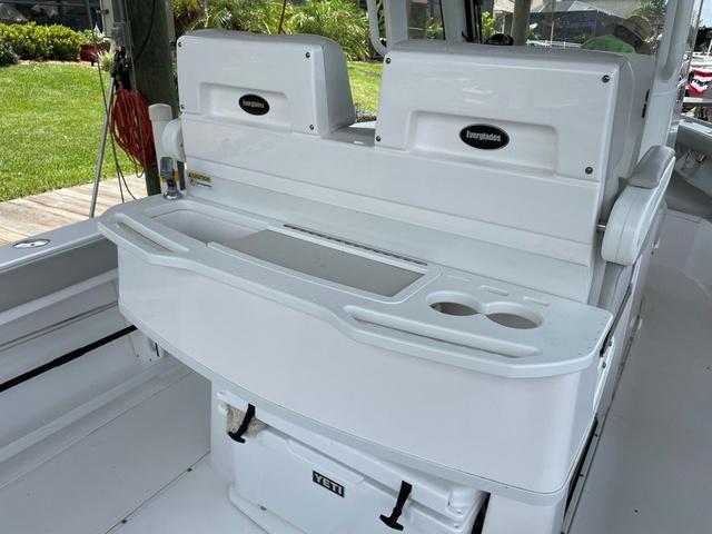 Slide: The Image of 2020 Everglades 255 CC boat interior with seating and storage area. - 3