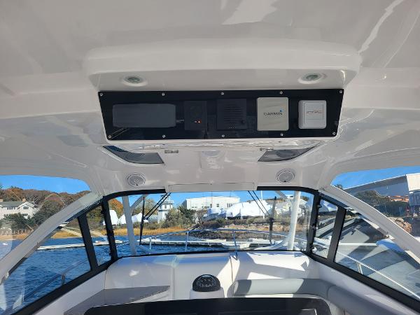 Slide: The Image of Interior view of 2018 Everglades 360 LXC boat with navigation equipment. - 3