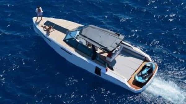 Slide: The Image of 2017 Evo Yachts 43 cruising on blue ocean waters. - 29