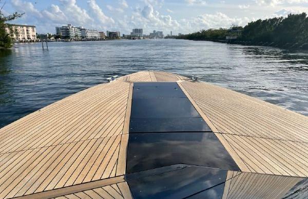 Slide: The Image of Bow view of 2017 Evo Yachts 43 on a calm waterway. - 7