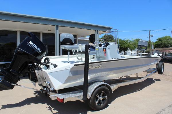 Slide: The Image of 2022 Excel Bay Pro 203 boat with Suzuki outboard motor on trailer. - 4