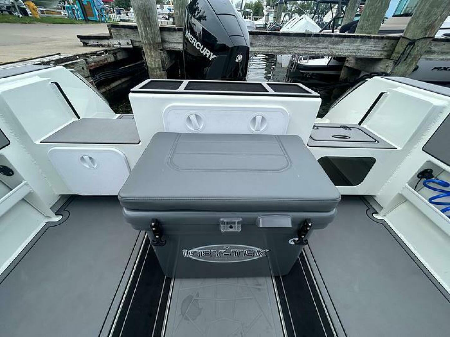 Slide: The Image of Extreme Boats 645 21' Center Console Aft view View looking aft of boarding and cooler - 5254822