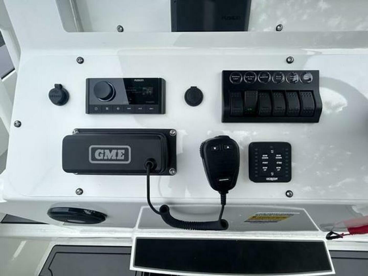 Slide: The Image of Extreme Boats 645 21' Center Console VHF Controls with VHS view on the Extreme Boats 645 21' Center Console - 5254816