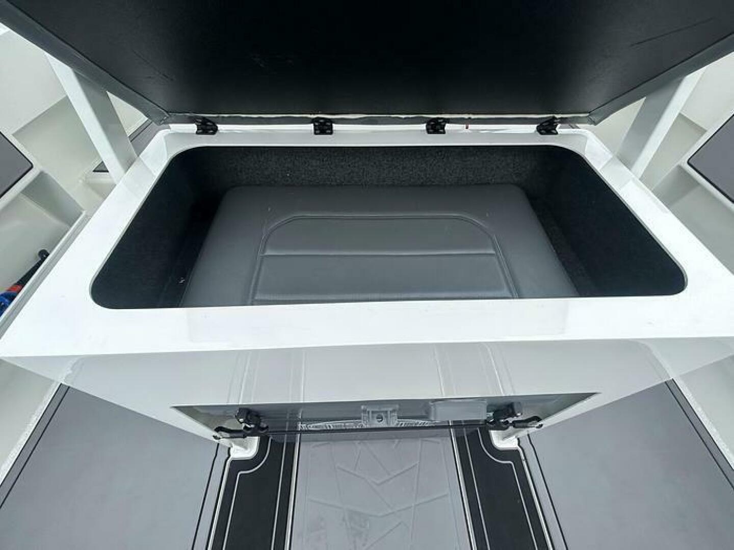 Slide: The Image of Extreme Boats 645 21' Center Console Storage View above cooler onExtreme Boats 645 21' Center Console - 5254821