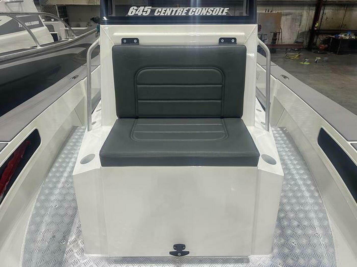 Slide: The Image of 2025 Extreme Boats 645 21' Center Console Bow seat and access to storage and head Bow Seating with access to storage and head on the 2025 Extreme Boats 645 21' Center Console - 5254796