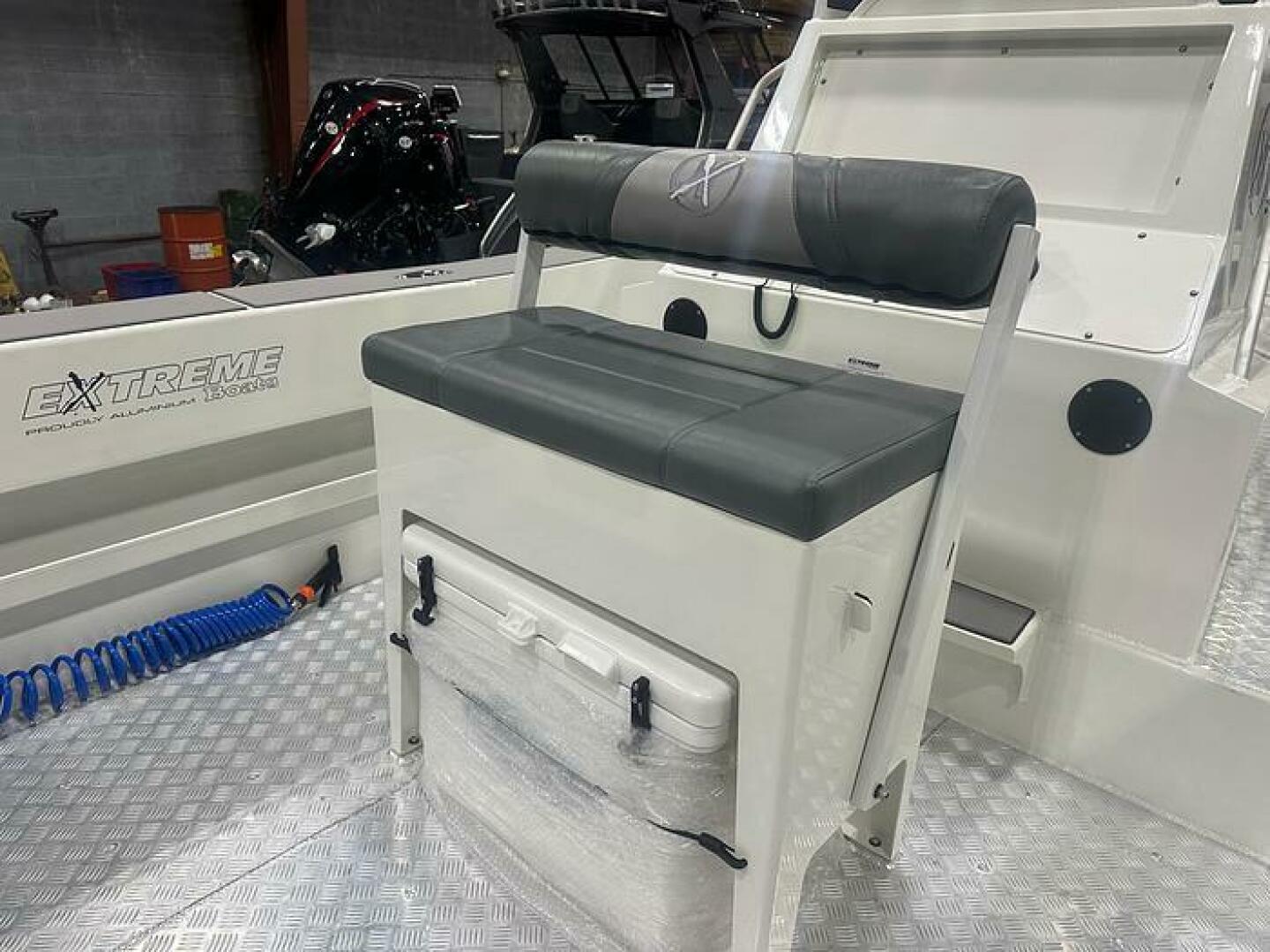 Slide: The Image of 2025 Extreme Boats 645 21' Center Console Flip Flop Seating with Cooler Seating and Cooler options on the 2025 Extreme Boats 645 21' Center Console - 5254800