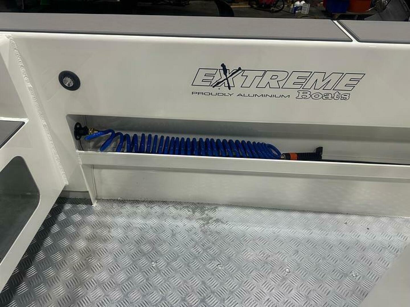 Slide: The Image of 2025 Extreme Boats 645 21' Center Console Washdown and Knee handwashing's Knee Hand wash and washdown on the 2025 Extreme Boats 645 21' Center Console - 5254801