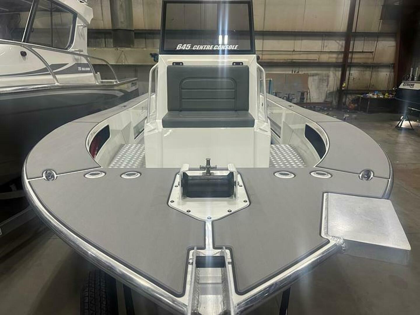 Slide: The Image of 2025 Extreme Boats 645 21' Center Console Bow View with Options Simple Bow Options on the 2025 Extreme Boats 645 21' Center Console - 5254787