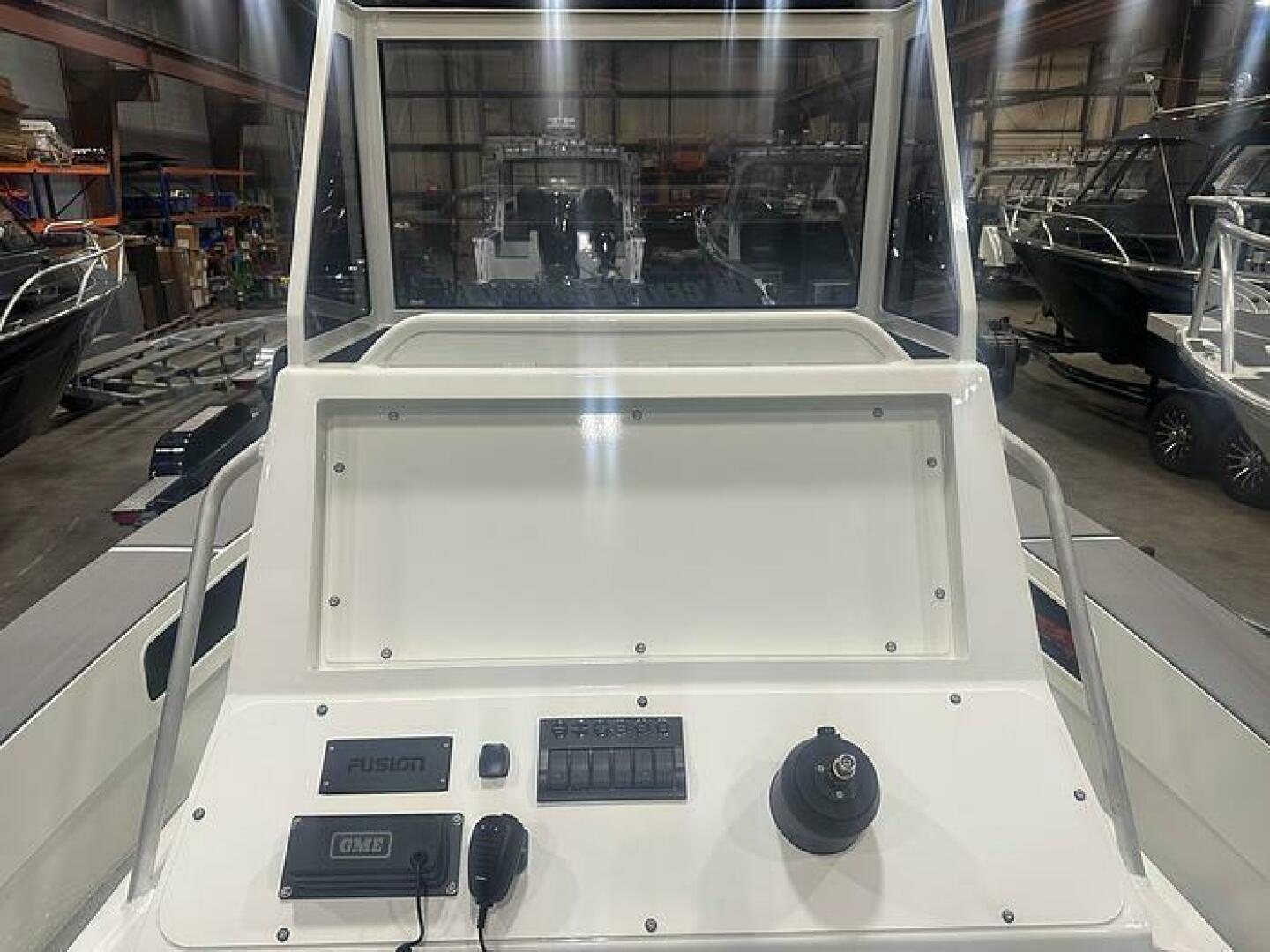 Slide: The Image of Helm on the 2025 Extreme Boats 645 21' Center Console Optional Electronics available on the 2025 Extreme Boats 645 21' Center Console - 5254791