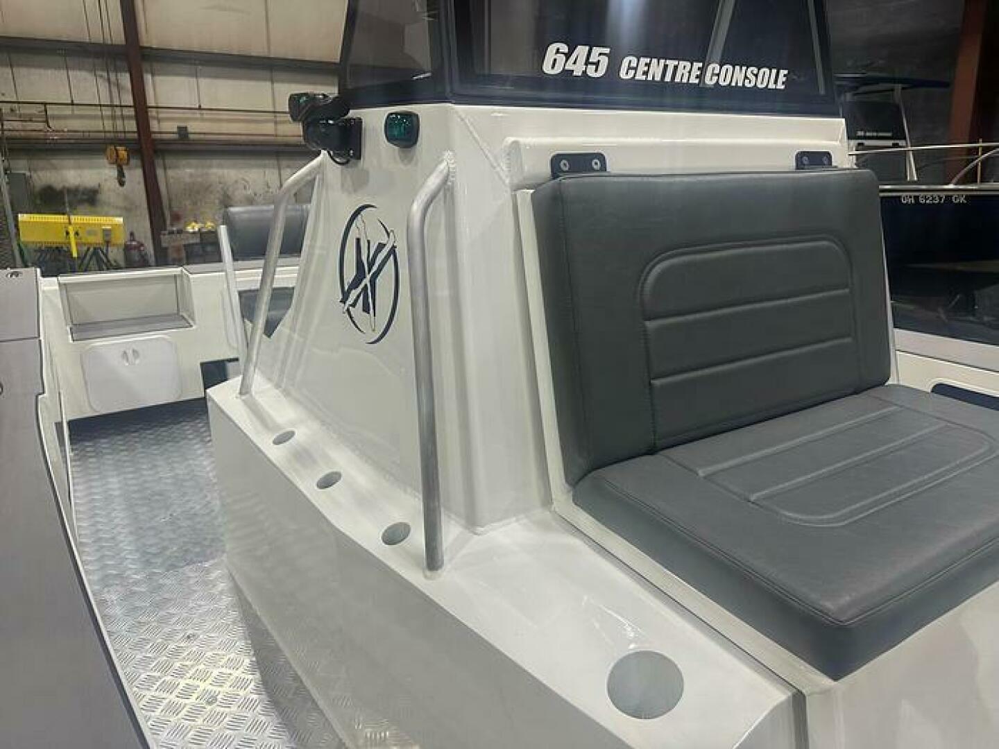 Slide: The Image of 2025 Extreme Boats 645 21' Center Console Rod Stoage and Center Console Module Center Console module on the 2025 Extreme Boats 645 21' Center Console - 5254799