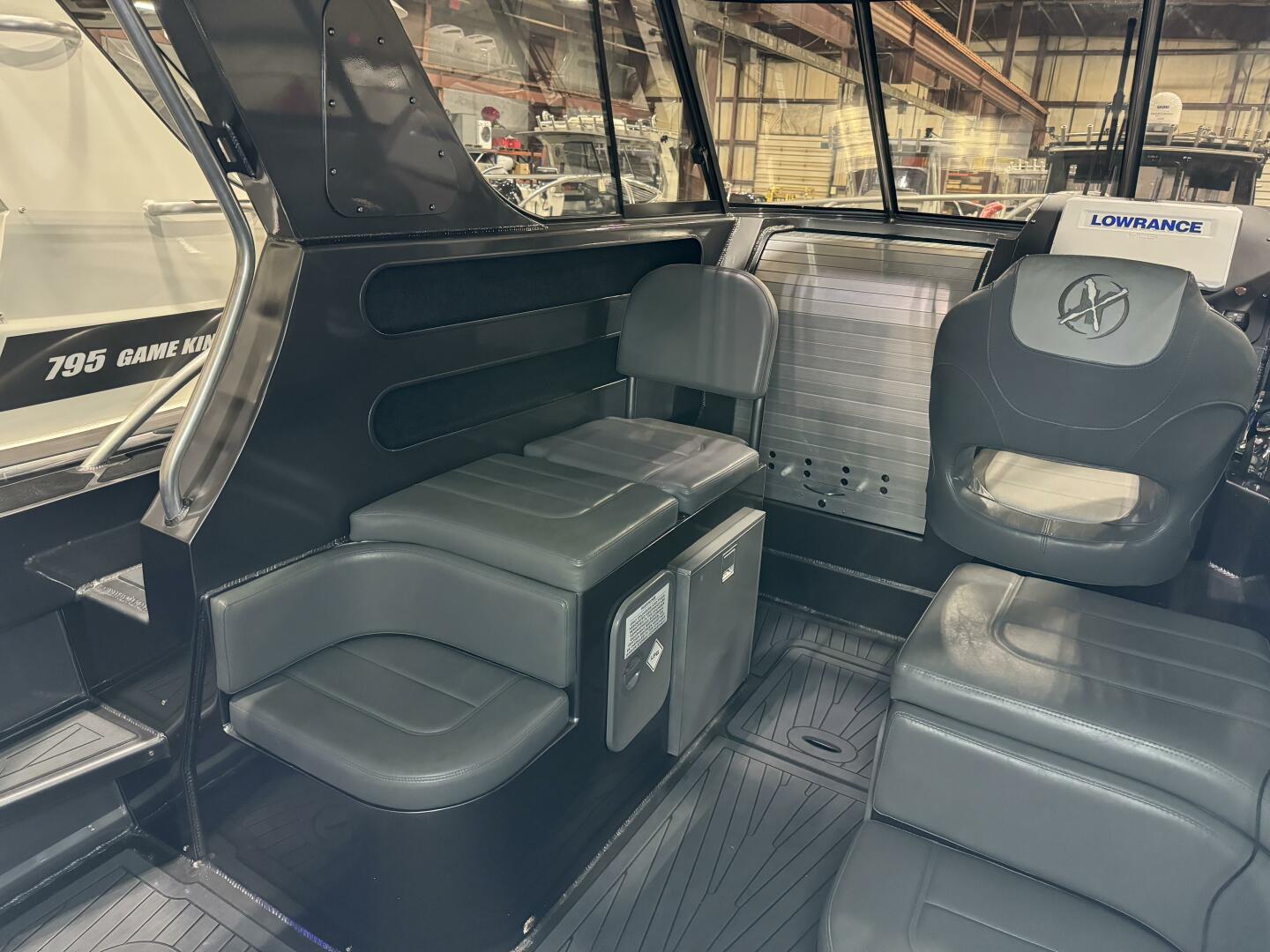 Slide: The Image of Curved Seating Optional curved seating on this 2020 Extreme Boats 795 Walk Around for sale by Parma Marine (440) 221-9001 - 5311268