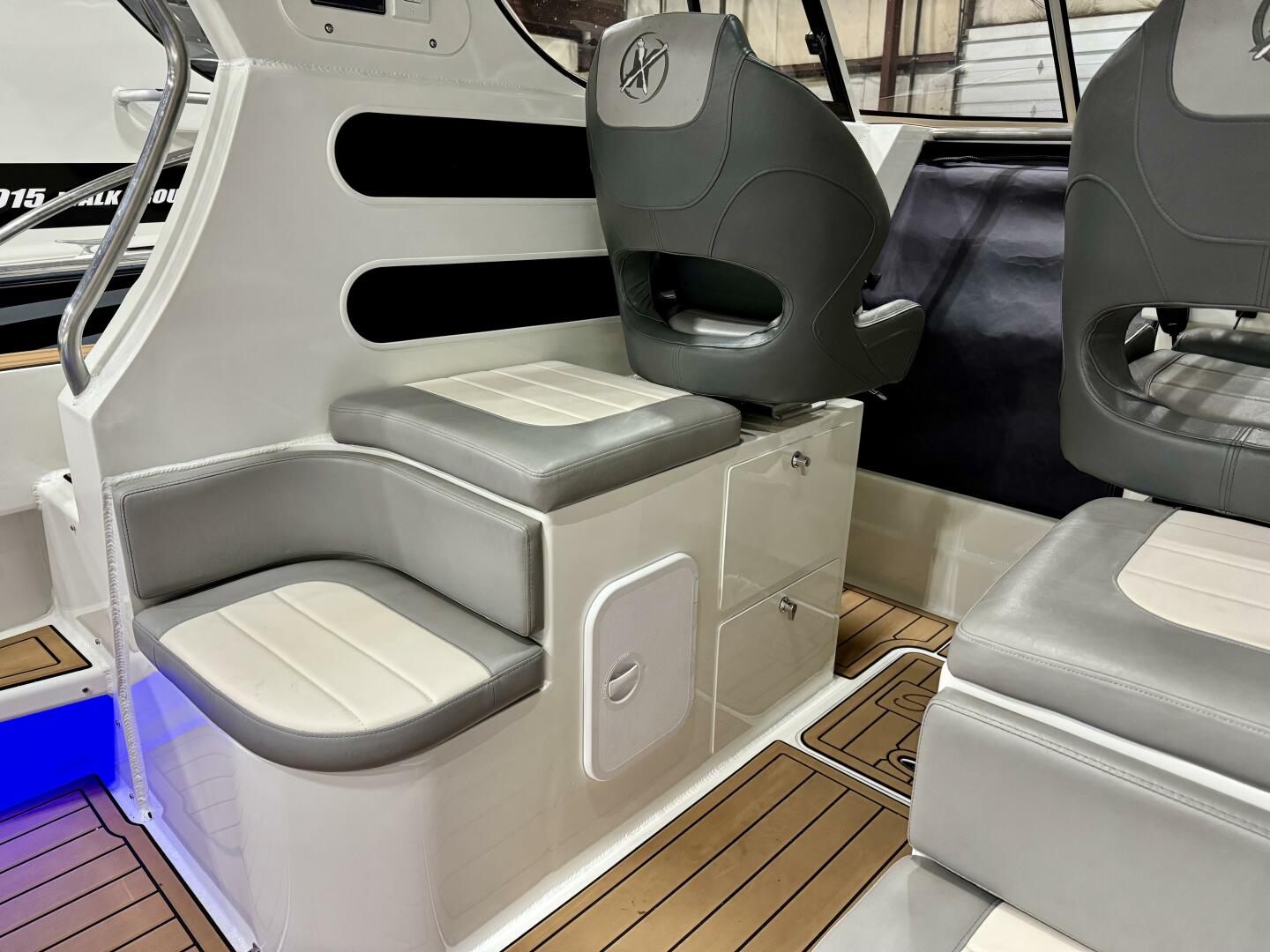 Slide: The Image of Custom 795 walkaround port side seating module 2024 Extreme Boats 795 Walk Around 26' Port Side Seating Module w/2 burner range, storage, cushions - 5185072