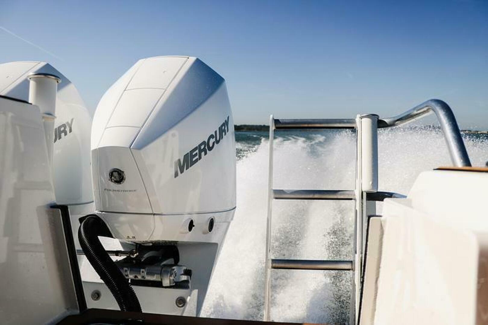 Slide: The Image of Running Show on the 2024 Extreme Boats 795 Walk Around 26' 2024 Extreme Boats 795 Walk Around 26' Running Shot of the Twin 200hp Mercury Motos and the Aft Cage  - 5184972