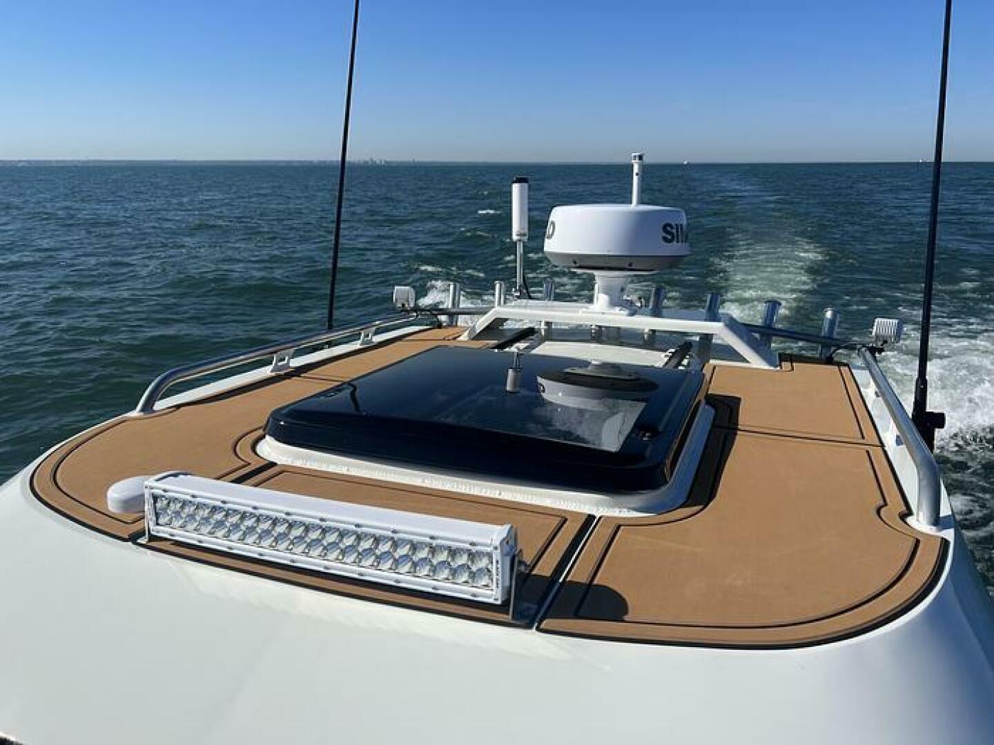 Slide: The Image of 2024 Extreme Boats 795 Walk Around 26' Hardtop options Closed Array Simrad Radar, Sunroof, and Light Bar - 5184986