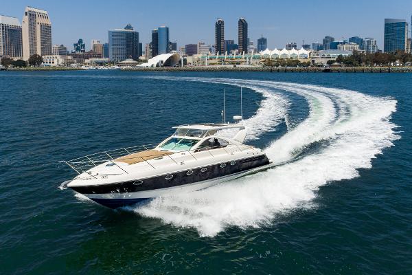 Slide: The Image of Fairline 48 Targa yacht cruising near city skyline, 2000 model. - 1