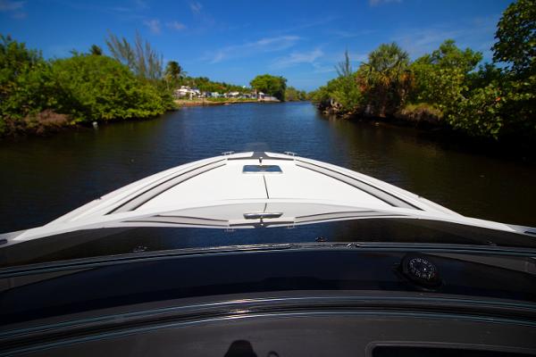 Slide: The Image of 2021 Fairline F Line 33 cruising on a scenic river. - 10