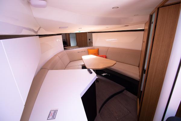 Slide: The Image of Interior of 2021 Fairline F Line 33 yacht with modern seating and table. - 13