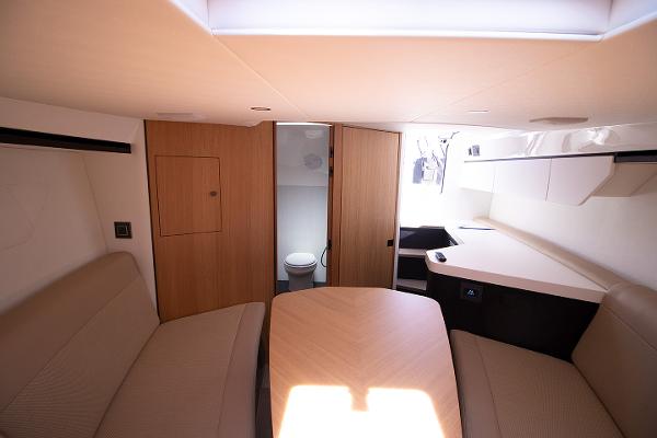 Slide: The Image of Interior of 2021 Fairline F Line 33 yacht with seating and bathroom. - 15