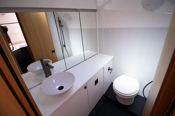 Slide: The Image of 2021 Fairline F Line 33 yacht bathroom with modern fixtures and sleek design. - 17