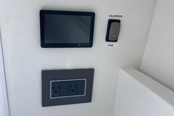 Slide: The Image of Control panel and outlets on 2022 Fairline F//Line 33 yacht interior. - 19