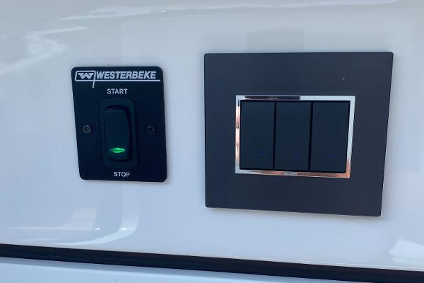 Slide: The Image of Control panel on 2022 Fairline F//Line 33 yacht with Westerbeke start-stop switch. - 20