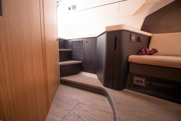 Slide: The Image of Interior of 2021 Fairline F Line 33 yacht with modern wooden and black finishes. - 23