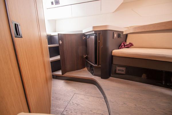 Slide: The Image of Interior cabin of 2021 Fairline F Line 33 yacht with wooden cabinetry and seating. - 24