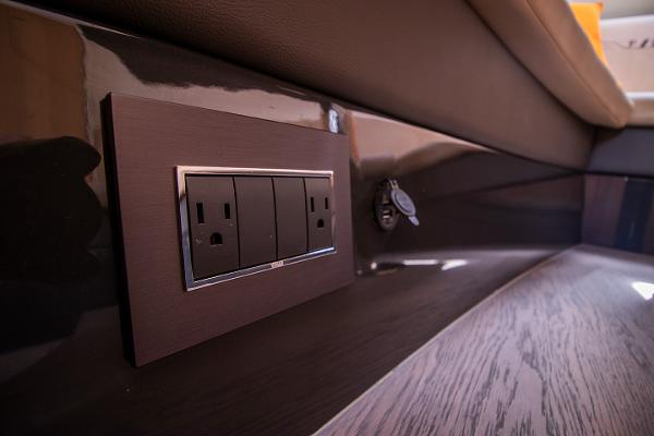 Slide: The Image of Power outlet and USB port on 2021 Fairline F Line 33 yacht interior. - 28
