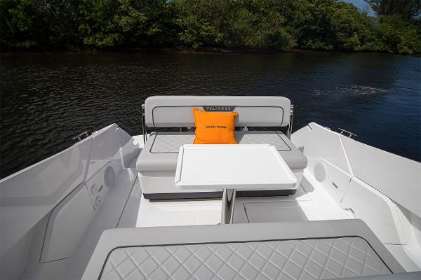 Slide: The Image of 2021 Fairline F Line 33 boat interior with seating and table. - 42