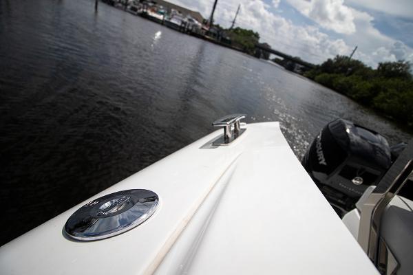 Slide: The Image of 2021 Fairline F Line 33 boat on a calm river. - 43