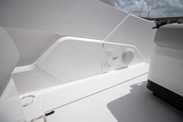 Slide: The Image of 2021 Fairline F Line 33 yacht deck with storage compartment and speaker. - 44