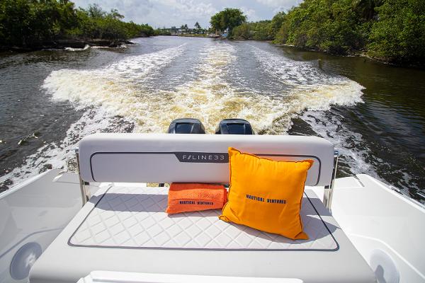 Slide: The Image of Fairline F Line 33 (2021) cruising on a river, view from the back seat. - 47