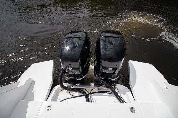 Slide: The Image of 2021 Fairline F Line 33 twin outboard motors on water. - 49