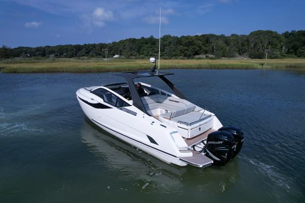 Slide: The Image of 2023 Fairline F//Line 33 Outboard luxury motor yacht on a serene lake. - 0