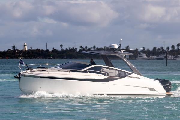 Slide: The Image of 2023 Fairline F//Line 33 Outboard cruising on a sunny day. - 1