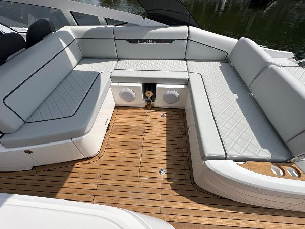 Slide: The Image of 2023 Fairline F//Line 33 Outboard boat with luxurious seating and teak deck. - 11