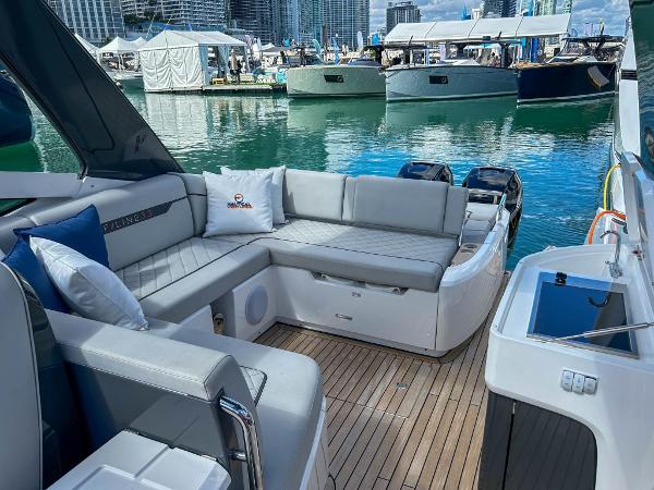 Slide: The Image of 2023 Fairline F//Line 33 Outboard luxury yacht interior with waterfront view. - 16