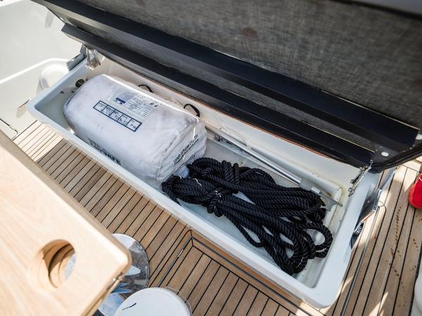 Slide: The Image of Storage compartment on 2023 Fairline F//Line 33 Outboard with ropes and equipment. - 16