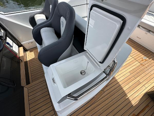 Slide: The Image of 2023 Fairline F//Line 33 Outboard interior with seating and sink. - 20