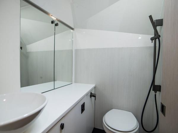 Slide: The Image of Modern bathroom in 2023 Fairline F//Line 33 Outboard yacht with sleek fixtures. - 26