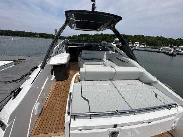 Slide: The Image of 2023 Fairline F//Line 33 Outboard luxury yacht with spacious deck and modern seating. - 8